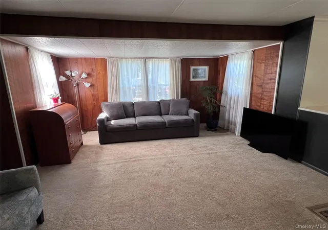 Photo 3 of Manufactured home for sale at 433 Mill Rd #91, Riverhead, NY 11933 | MLS# 1049944 | Listing updated on 2026-09-15