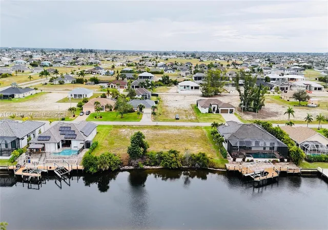 Photo 1 of Sale Pending at 718 Nw 38th Pl, Cape Coral, FL 33993 | MLS# A4595795 | Listing updated on 2026-09-29
