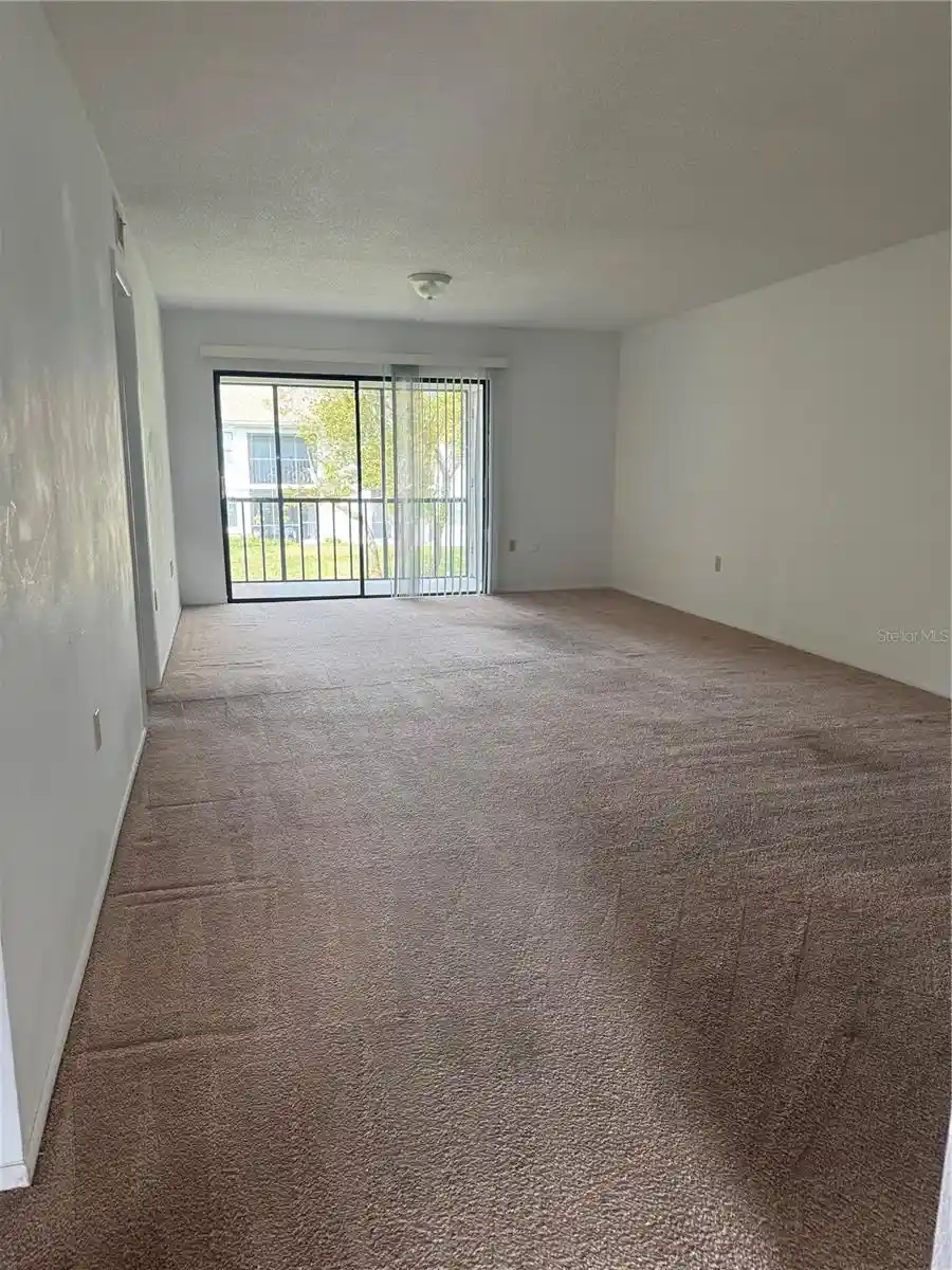 Listing Photo 2 - Condo for sale in 106 Lakeside Ct located at 106 Lakeside Ct, OLDSMAR, FL 34677 - Unit 106 Lakeside Ct