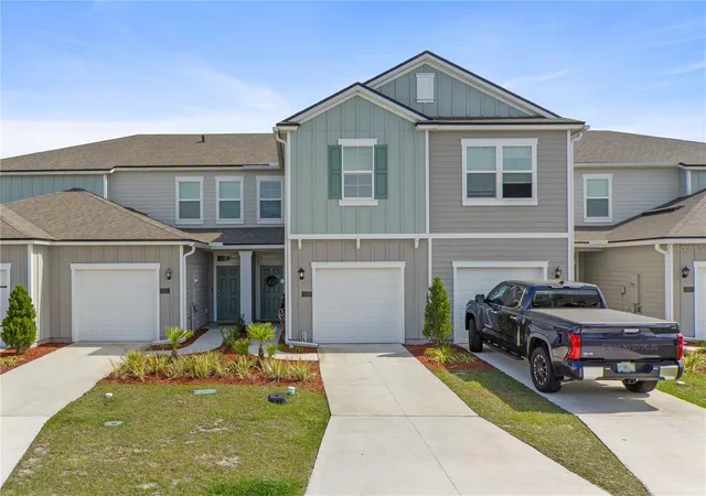 Photo 1 of Townhouse for sale at 117 Redbud Rd, Palm Coast, FL 32137 | MLS# TB8366457 | Listing updated on 2026-09-25