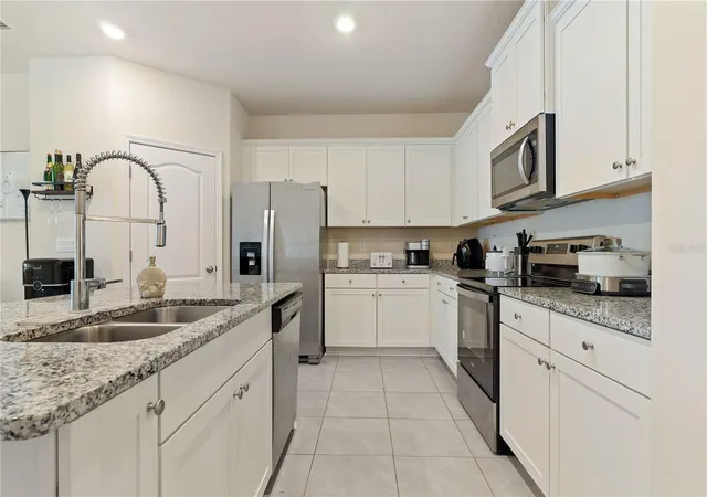 Photo 2 of Townhouse for sale at 117 Redbud Rd, Palm Coast, FL 32137 | MLS# TB8366457 | Listing updated on 2026-09-25