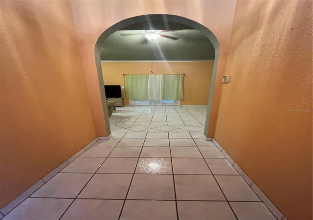 Photo 3 of Single family home for sale at 306 Aylesbury Ct, Kissimmee, FL 34758 | MLS# O6318976 | Listing updated on 2026-10-21