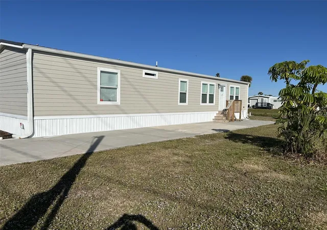 Photo 3 of Manufactured home for sale at 1391 Flamingo Dr, Englewood, FL 34224 | MLS# D6143112 | Listing updated on 2026-09-11