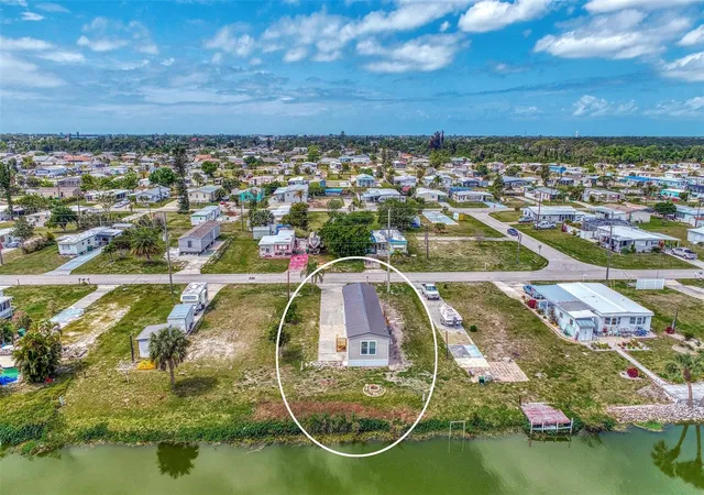 Photo 3 of Manufactured home for sale at 1391 Flamingo Dr, Englewood, FL 34224 | MLS# D6143112 | Listing updated on 2026-09-11