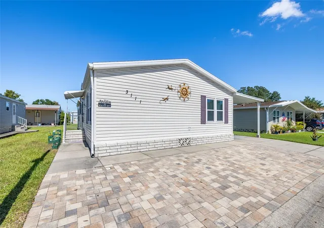 Photo 2 of Manufactured home for sale at 3111 Short Leaf St, Wesley Chapel, FL 33543 | MLS# TB8410716 | Listing updated on 2026-10-04