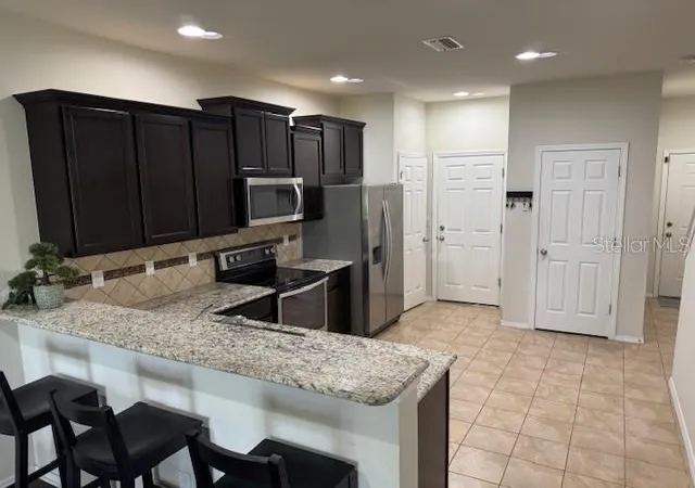 Photo 3 of Townhouse for sale at 8723 Turnstone Hvn Pl, Tampa, FL 33619 | MLS# TB8412436 | Listing updated on 2026-10-02