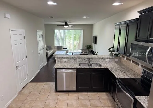 Photo 4 of Townhouse for sale at 8723 Turnstone Hvn Pl, Tampa, FL 33619 | MLS# TB8412436 | Listing updated on 2026-10-02