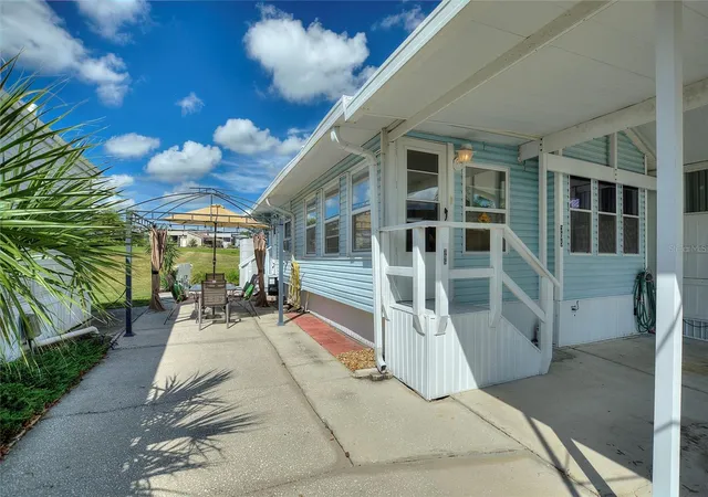 Photo 3 of Manufactured home for sale at 305 Arnold Palmer Dr, Davenport, FL 33837 | MLS# O6345107 | Listing updated on 2026-09-15