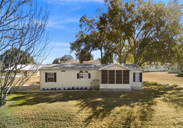 Photo 3 of Manufactured home for sale at 7964 SW 6th Place, Ocala, FL 34474 | MLS# OM710131 | Listing updated on 2026-09-11