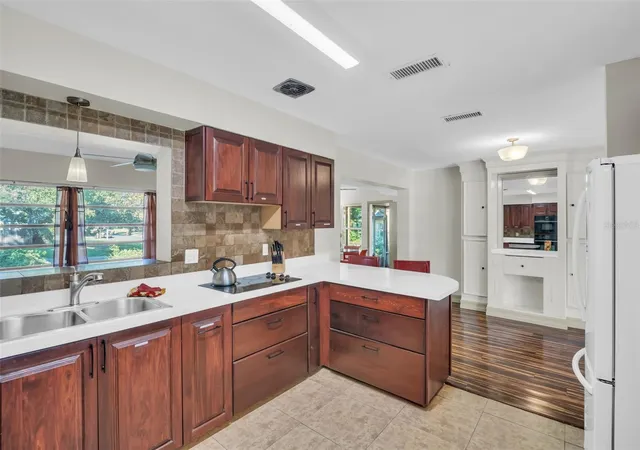 Photo 3 of Single family home for sale at 1182 Norwood Ave, Clearwater, FL 33756 | MLS# TB8437143 | Listing updated on 2026-10-12