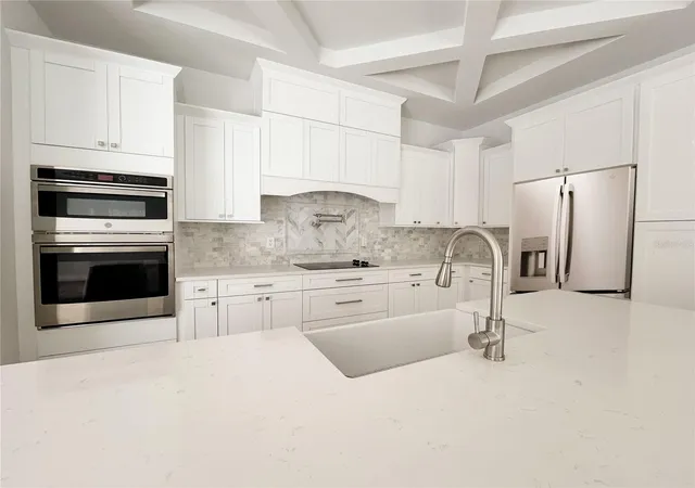 Photo 2 of Single family home for sale at 407 Georgia Ave, Crystal Beach, FL 34681 | MLS# TB8442830 | Listing updated on 2026-09-29