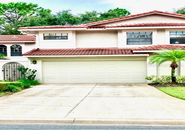 Photo 1 of Townhouse for sale at 8214 Ambrose Cvs Way, Orlando, FL 32819 | MLS# O6357956 | Listing updated on 2026-09-29