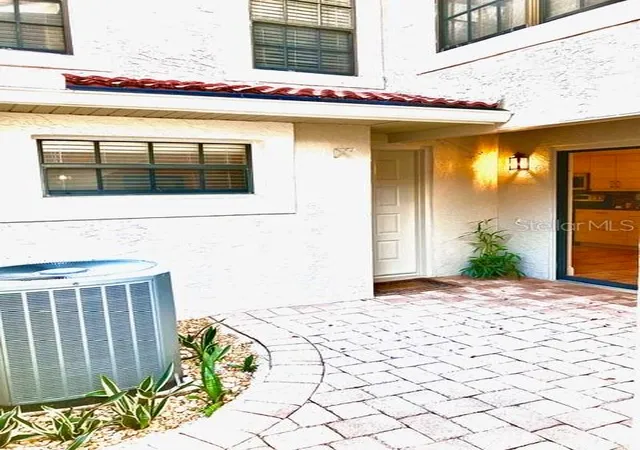 Photo 3 of Townhouse for sale at 8214 Ambrose Cvs Way, Orlando, FL 32819 | MLS# O6357956 | Listing updated on 2026-09-29