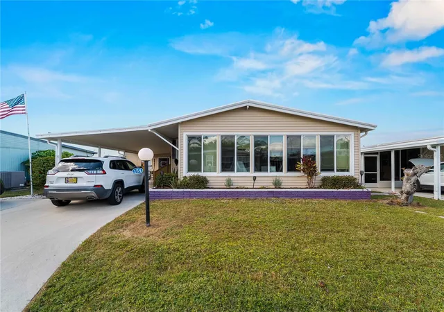 Photo 2 of Manufactured home for sale at 154 Rarotonga Rd, North Port, FL 34287 | MLS# C7517755 | Listing updated on 2026-09-15