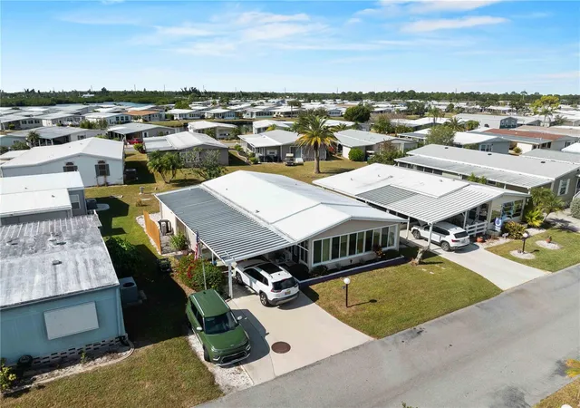 Photo 3 of Manufactured home for sale at 154 Rarotonga Rd, North Port, FL 34287 | MLS# C7517755 | Listing updated on 2026-09-15