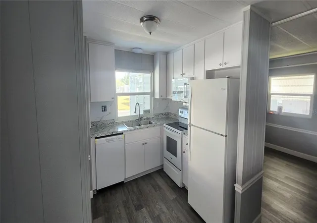 Photo 4 of Manufactured home for sale at 10803 Freedom Dr, Port Richey, FL 34668 | MLS# W7881050 | Listing updated on 2026-10-16