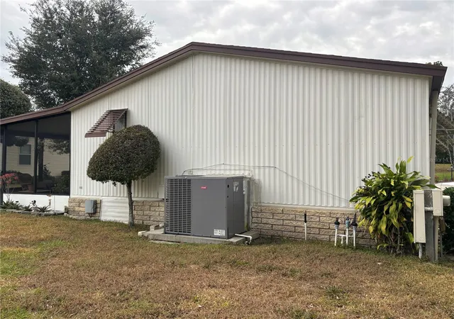 Photo 3 of Manufactured home for sale at 3833 Olax Ct, Zellwood, FL 32798 | MLS# O6364369 | Listing updated on 2026-09-30