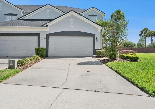 Photo 1 of Townhouse for sale at 1215 Shallcross Ave, Orlando, FL 32828 | MLS# O6364960 | Listing updated on 2026-09-11