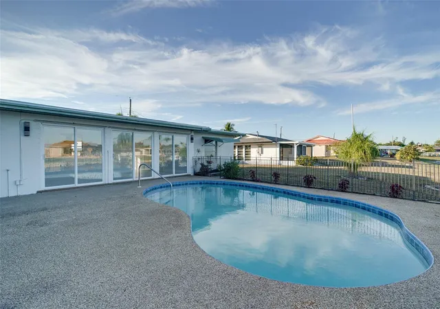 Photo 2 of Single family home for sale at 217 W Tarpon Blvd Nw, Port Charlotte, FL 33952 | MLS# A4675001 | Listing updated on 2026-10-20