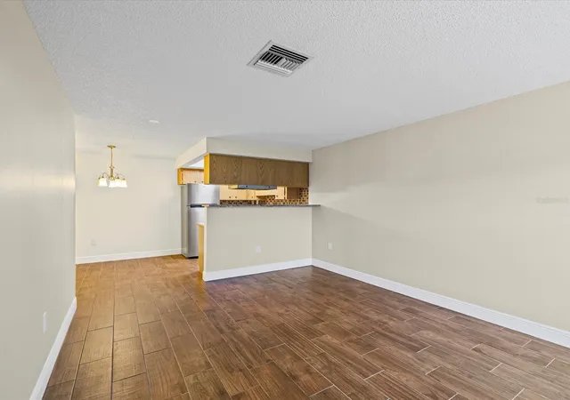 Listing Photo 4 - Condo for sale in building located at 6037 Chesham Dr, NEW PORT RICHEY, FL 34653 - Unit #7