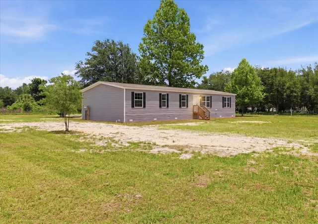 Photo 2 of Manufactured home for sale at 11975 NE 227th Place, Fort Mc Coy, FL 32134 | MLS# P4937407 | Listing updated on 2026-10-02