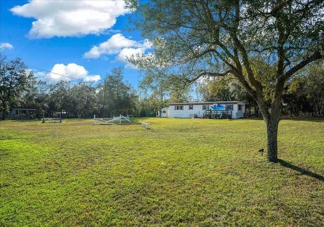 Photo 2 of Manufactured home for sale at 6250 SE 150th Avenue, Morriston, FL 32668 | MLS# OM716103 | Listing updated on 2026-09-15