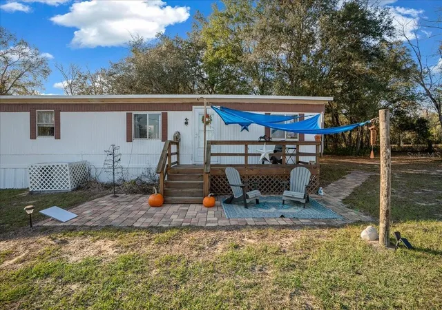 Photo 4 of Manufactured home for sale at 6250 SE 150th Avenue, Morriston, FL 32668 | MLS# OM716103 | Listing updated on 2026-09-15