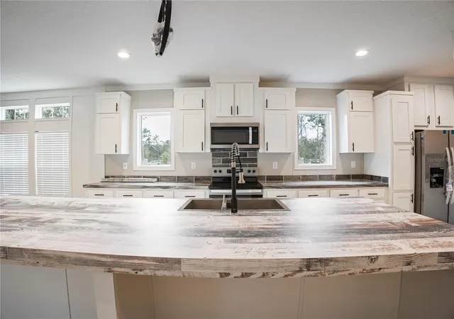 Photo 2 of Manufactured home for sale at 45 Kelly Ridge Rd, Frostproof, FL 33843 | MLS# K4903214 | Listing updated on 2026-10-06