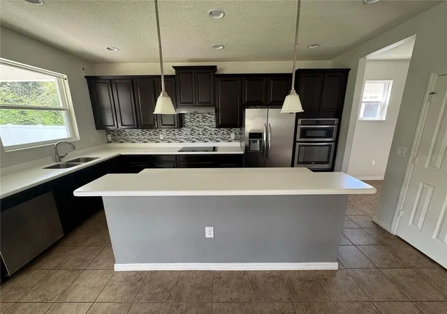 Photo 3 of Single family home for sale at 2936 Boating Blvd, Kissimmee, FL 34746 | MLS# O6377376 | Listing updated on 2026-09-11