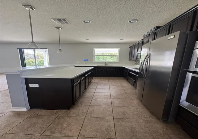 Photo 4 of Single family home for sale at 2936 Boating Blvd, Kissimmee, FL 34746 | MLS# O6377376 | Listing updated on 2026-09-11