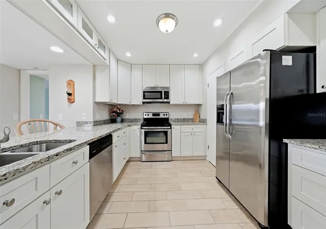 Photo 4 of Condo for sale at 301 Mariner Dr #301, Tarpon Springs, FL 34689 | MLS# TB8469783 | Listing updated on 2026-09-19