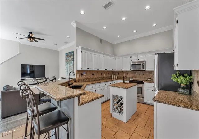 Photo 4 of Single family home for sale at 2409 Jenna Ln, Lakeland, FL 33813 | MLS# L4959019 | Listing updated on 2026-09-22