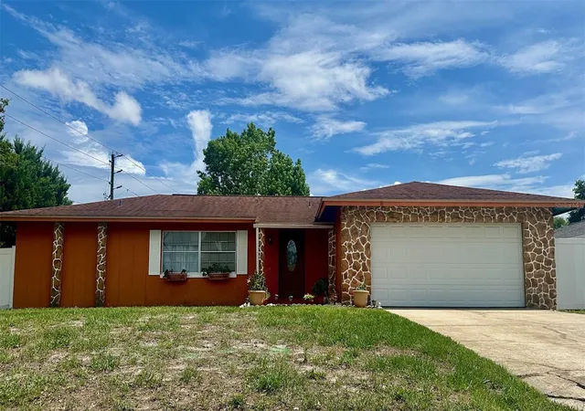Photo 2 of Single family home for sale at 7002 Crestlake Dr, Orlando, FL 32819 | MLS# S5143293 | Listing updated on 2026-10-17