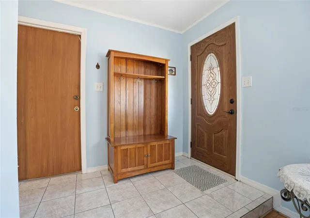 Photo 4 of Single family home for sale at 7002 Crestlake Dr, Orlando, FL 32819 | MLS# S5143293 | Listing updated on 2026-10-17