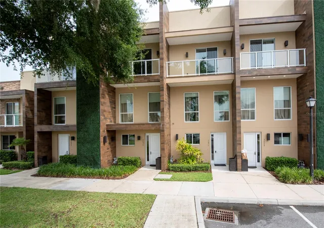 Photo 1 of Townhouse for sale at 7673 Recife Dr, Kissimmee, FL 34747 | MLS# O6380610 | Listing updated on 2026-10-27