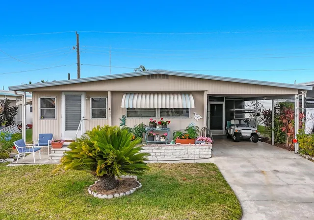 Photo 1 of Manufactured home for sale at 411 Tropic Dr W, Palmetto, FL 34221 | MLS# S5144880 | Listing updated on 2026-09-11
