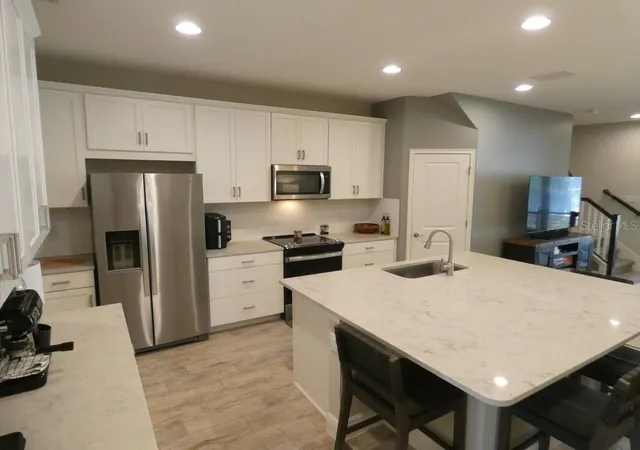 Photo 3 of Townhouse for sale at 1505 Sunset Wind Loop, Oldsmar, FL 34677 | MLS# W7883526 | Listing updated on 2026-09-11