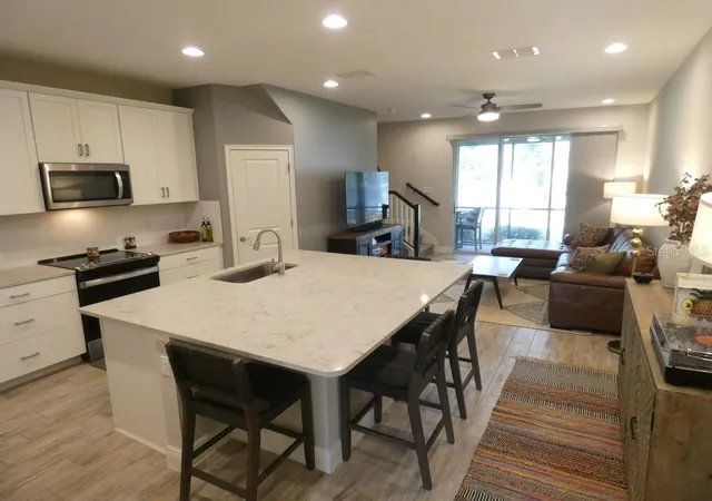 Photo 4 of Townhouse for sale at 1505 Sunset Wind Loop, Oldsmar, FL 34677 | MLS# W7883526 | Listing updated on 2026-09-11