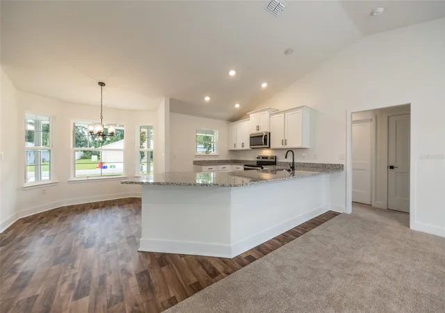 Photo 3 of Single family home for sale at 21 Richmond Dr, Palm Coast, FL 32164 | MLS# FC316709 | Listing updated on 2026-10-04