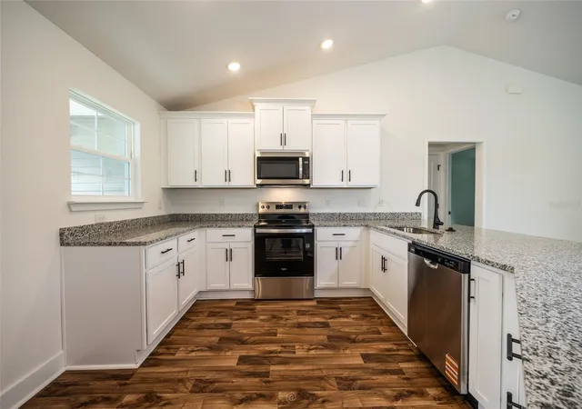 Photo 3 of Single family home for sale at 21 Richmond Dr, Palm Coast, FL 32164 | MLS# FC316709 | Listing updated on 2026-10-04