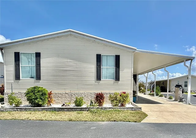Photo 1 of Manufactured home for sale at 136 Americana Ct NE #230, St Petersburg, FL 33702 | MLS# TB8484211 | Listing updated on 2026-10-06
