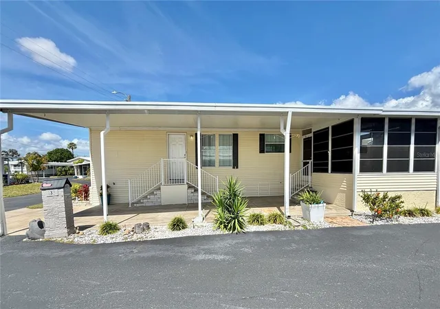 Photo 2 of Manufactured home for sale at 136 Americana Ct NE #230, St Petersburg, FL 33702 | MLS# TB8484211 | Listing updated on 2026-10-06