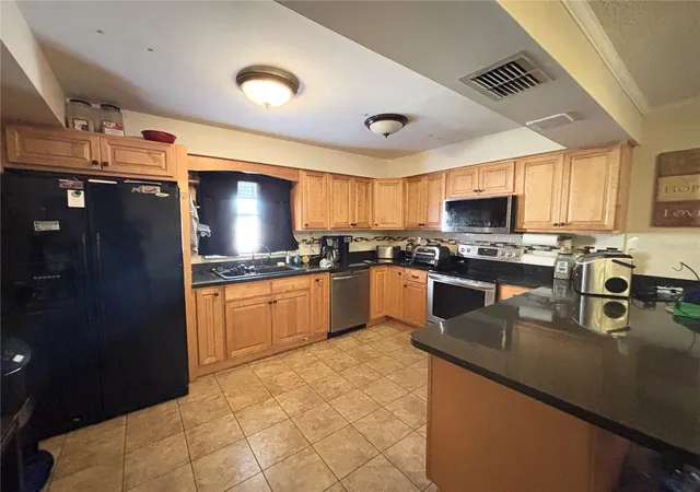 Photo 3 of Single family home for sale at 103 Davis St, Auburndale, FL 33823 | MLS# L4960131 | Listing updated on 2026-09-11