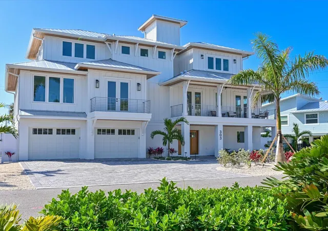 Single family home for sale at 303 55th Street, Holmes Beach, FL 34217 | MLS# A4685639 | Listing updated on 2026-09-11