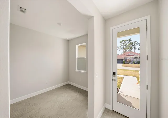 Photo 3 of Single family home for sale at 34 Seville Orange Path, Palm Coast, FL 32164 | MLS# FC316818 | Listing updated on 2026-10-05