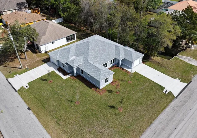 Photo 2 of Multi family home for sale at 95 Providence Ln, Palm Coast, FL 32164 | MLS# FC316893 | Listing updated on 2026-10-08