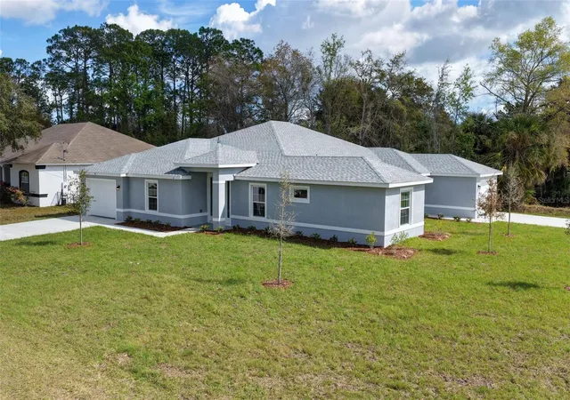 Photo 3 of Multi family home for sale at 95 Providence Ln, Palm Coast, FL 32164 | MLS# FC316893 | Listing updated on 2026-10-08