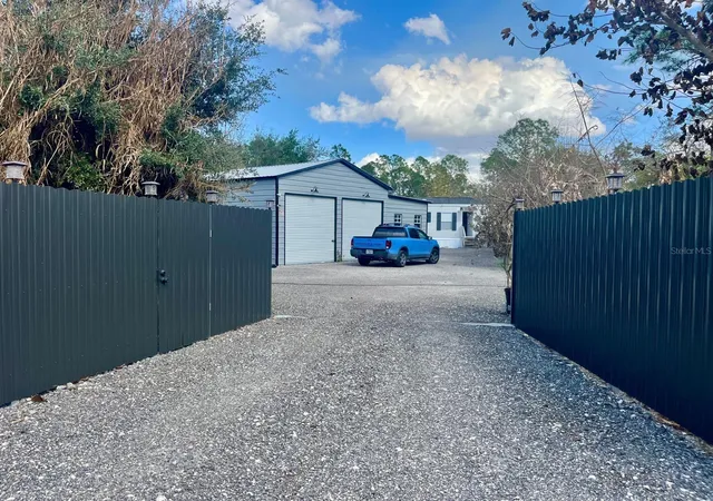 Photo 1 of Manufactured home for sale at 345 N Hacienda St, Clewiston, FL 33440 | MLS# OM720807 | Listing updated on 2026-10-05