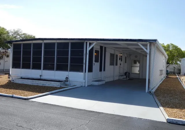 Photo 1 of Condo for sale at 3612 Tiki Dr, Holiday, FL 34691 | MLS# W7883913 | Listing updated on 2026-09-14