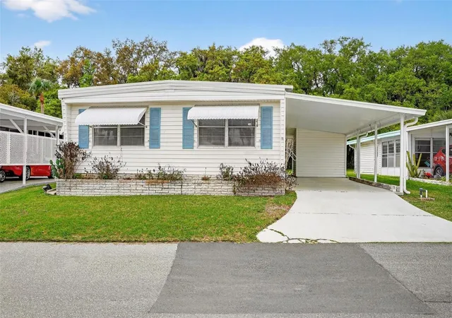 Manufactured home for sale at 7 Cocos Plumosa Dr #A, EUSTIS, FL 32726 | MLS# G5109650